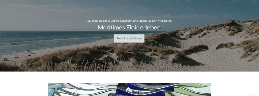 Bild vom oberen Teil eines Onlineshops mit einem großformatigen Bild von einer Strandszene und Überschrift: Maritimes Flair erleben.