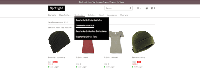 Kategorieseite mit ausgeklapptem Untermenü der Kategorie "Geschenke" im Header. Das Untermenü zeigt als Beispiele die folgenden Kategorien: Geschenke für Designliebhaber, Geschenke unter 50 €, Geschenke für Outdoor-Enthusiasten, Geschenk für Deko-Fans.